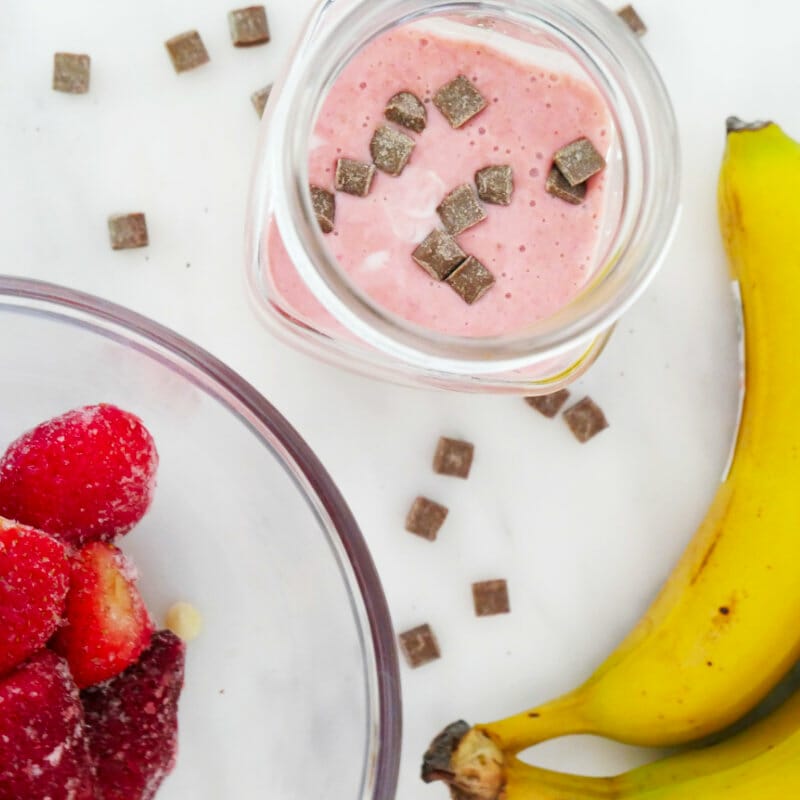 Strawberries, banana, chocolate chips and a fruit smoothie