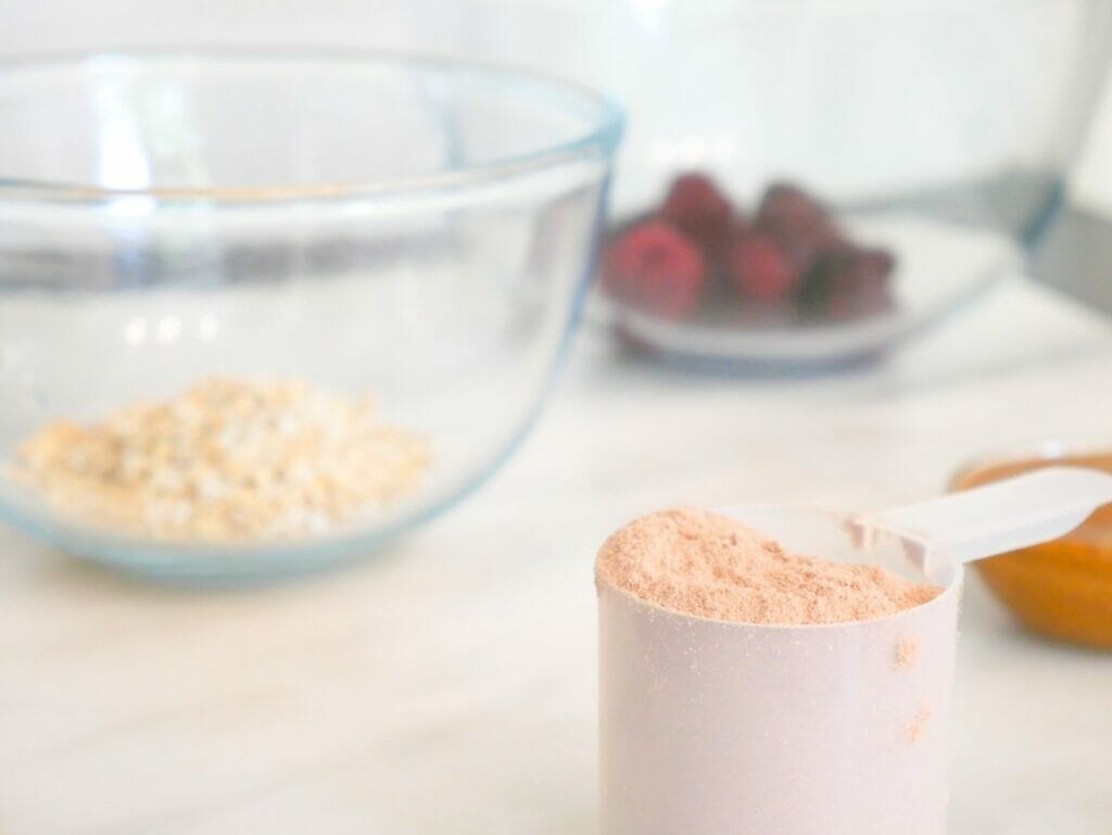 Almond butter and berry protein shake weight gain smoothie ingredients laid-out