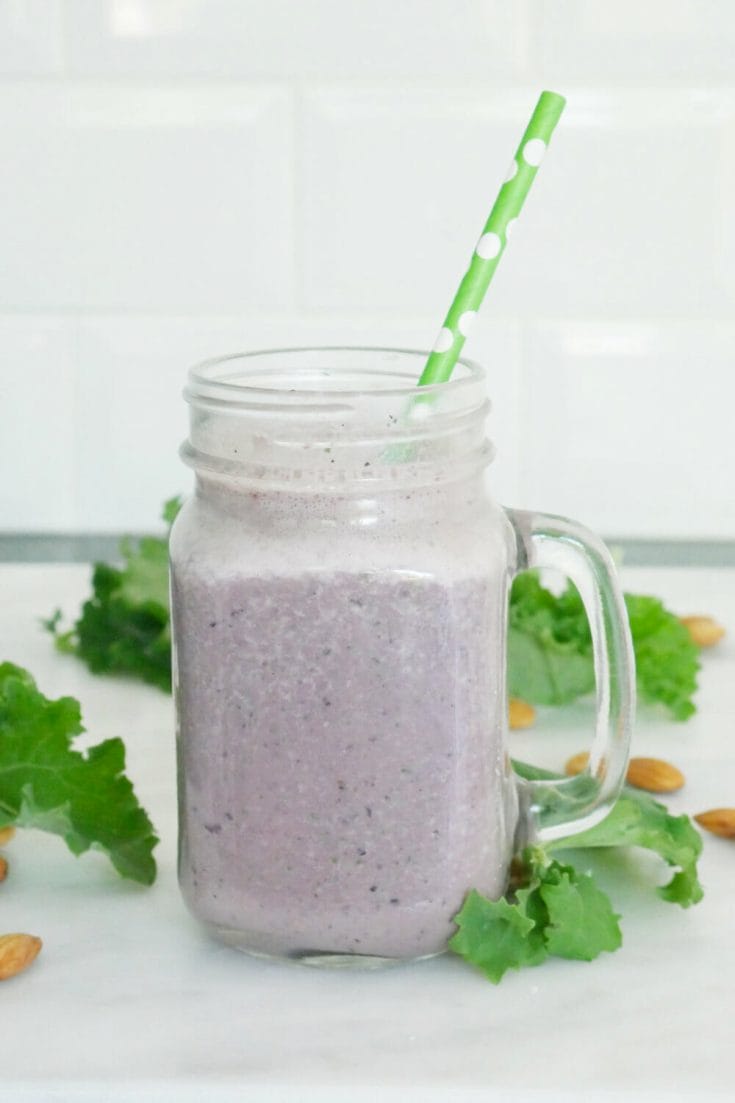 Blueberry kale smoothie recipe smoothie with ingredients and green straw