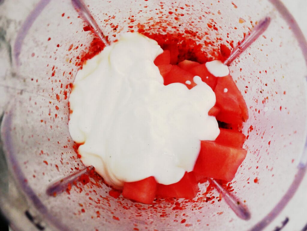Coconut yogurt in watermelon and strawberry smoothie